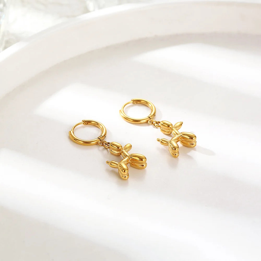Gold Huggie Earrings with Mini Balloon Dog Charm 1